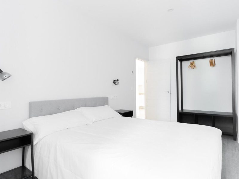 Habitación principal del apartamento Galizano con cama de matrimonio